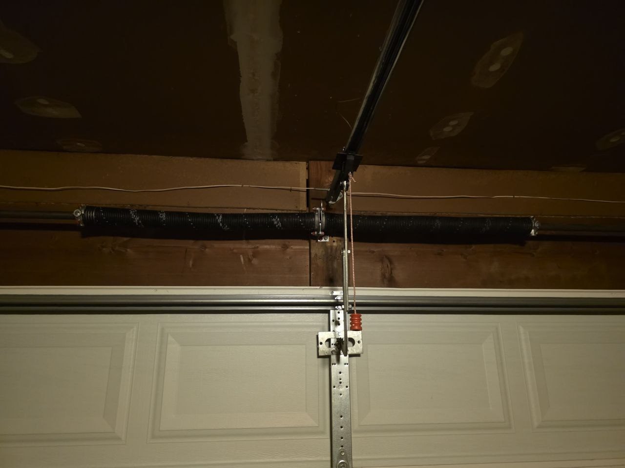 Broken garage door torsion springs in Fenton, MO before replacement