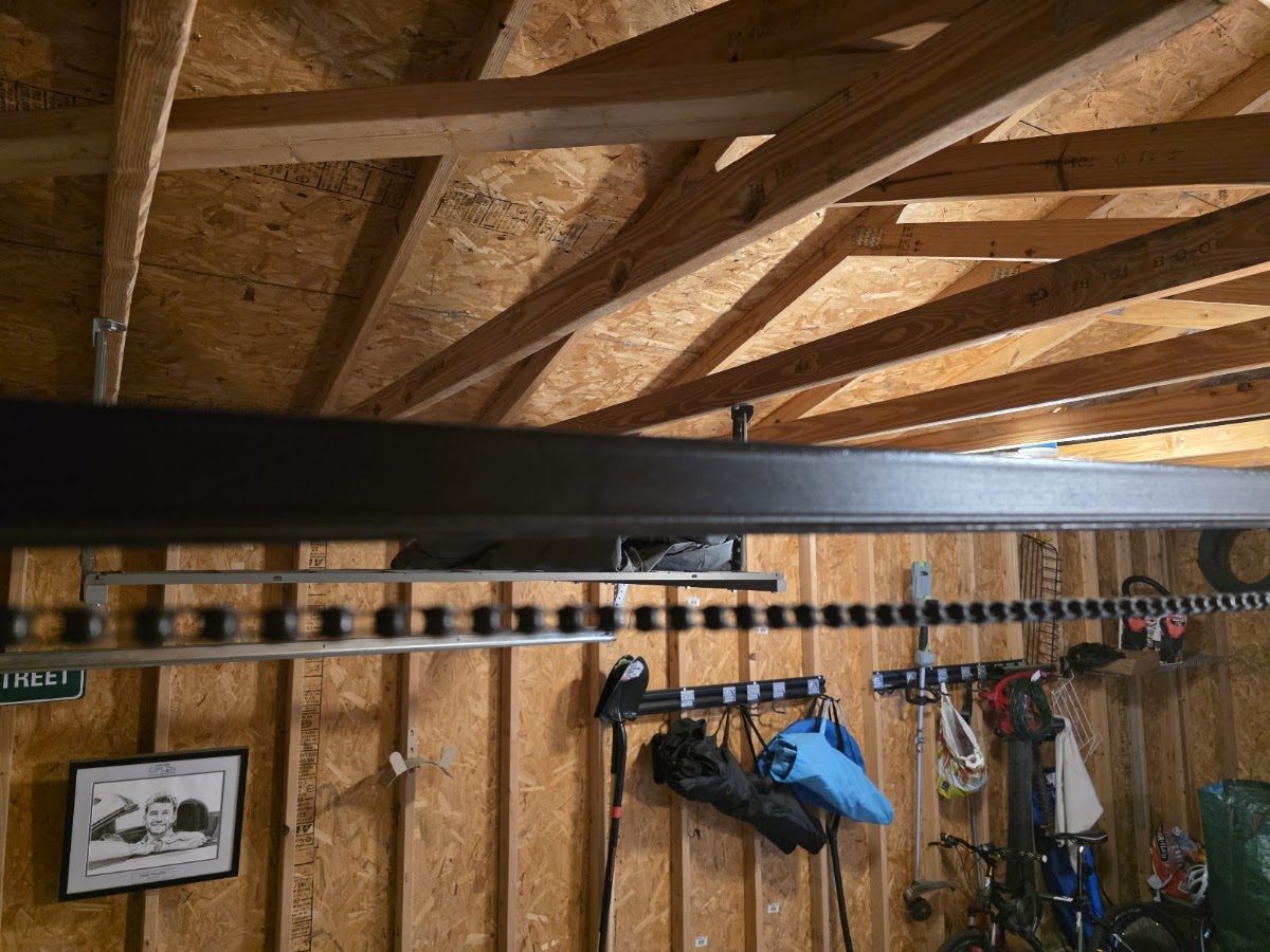 Loose garage door opener chain before adjustment