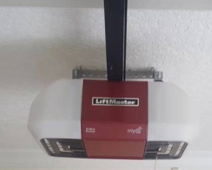 Older LiftMaster garage door opener before service