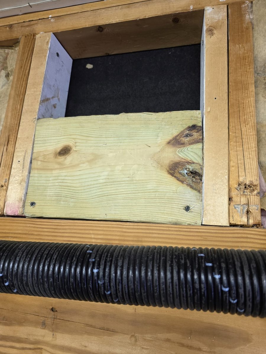Garage door wood support reinforced by Open Sesame Garage Door Service