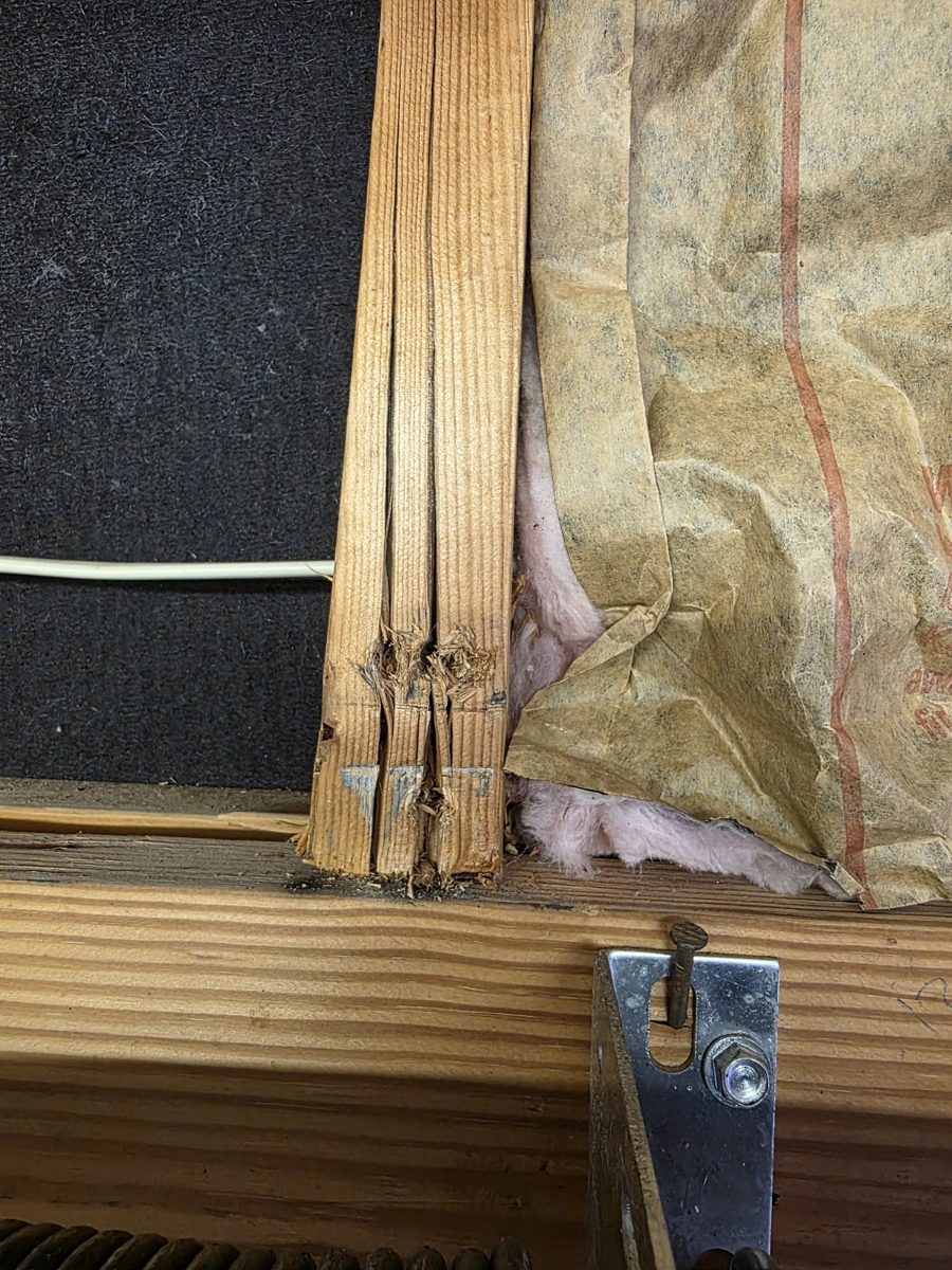 Garage door wood support before reinforcement