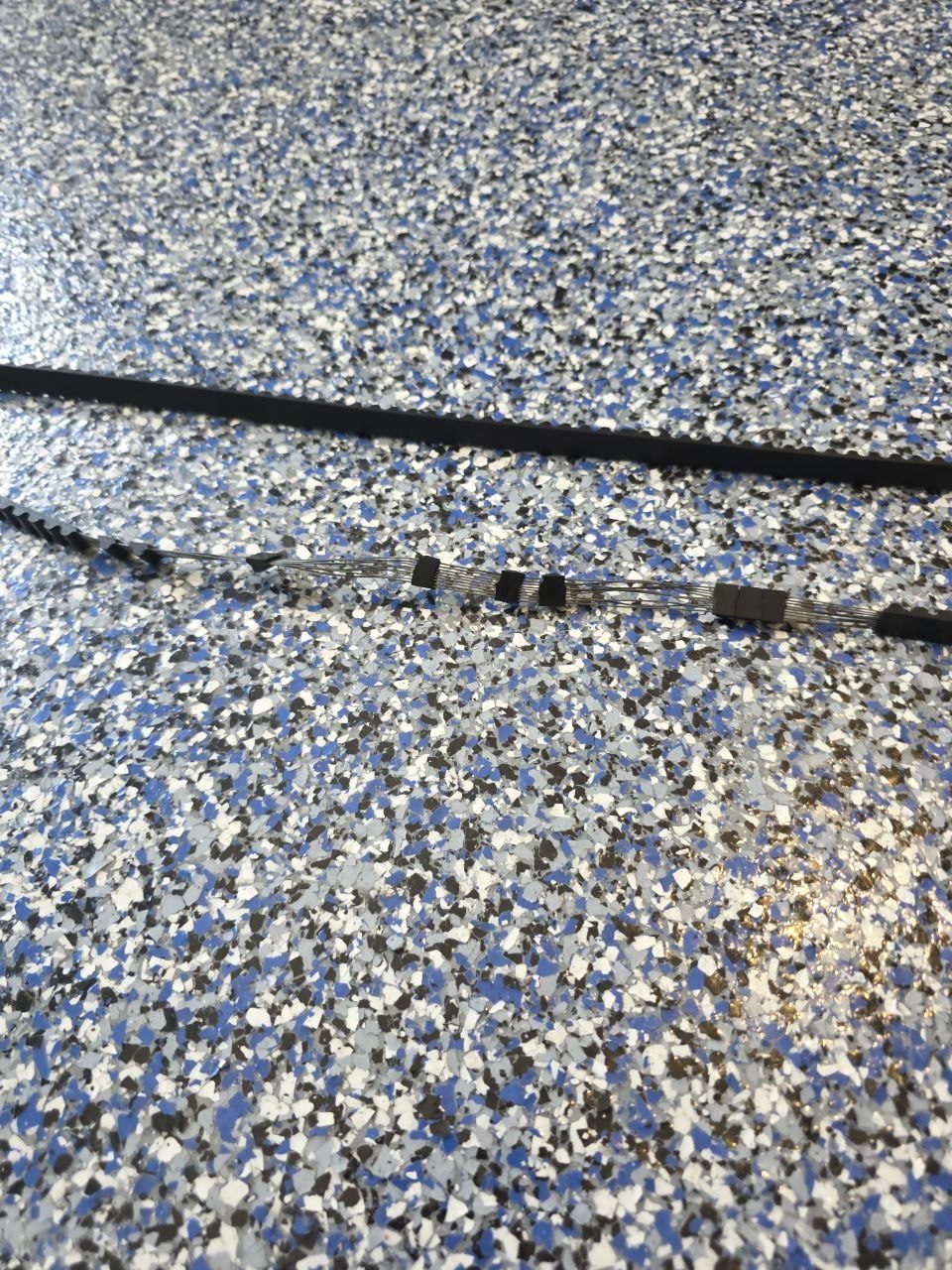 Garage door opener belt before service and adjustment