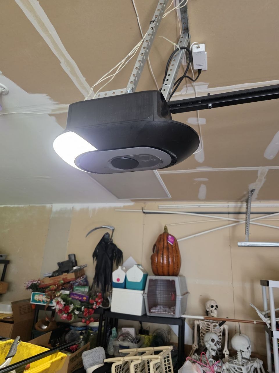New black smart garage door opener installed after replacement