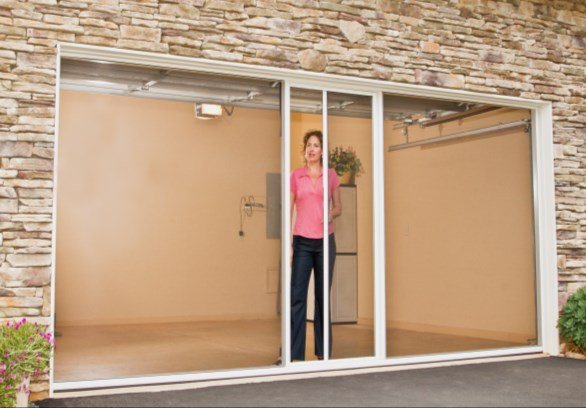 Lifestyle garage screen with center passage door